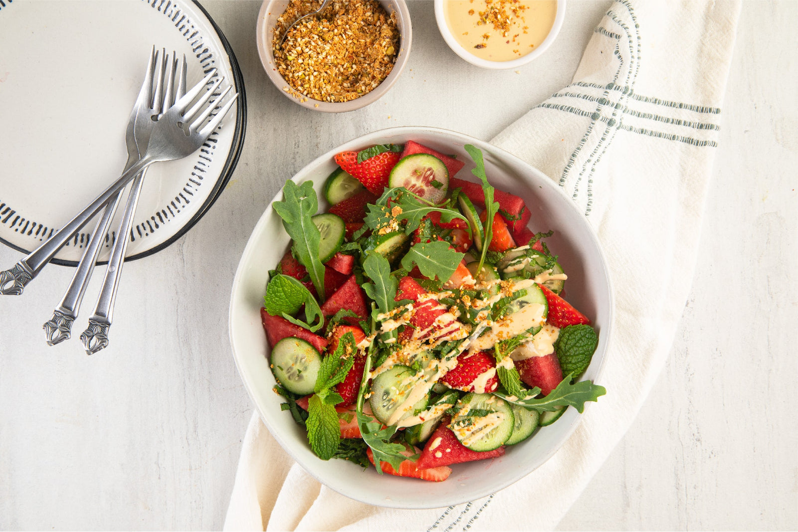 Minted Watermelon and Strawberry Salad with Dukkah Tahini Dressing