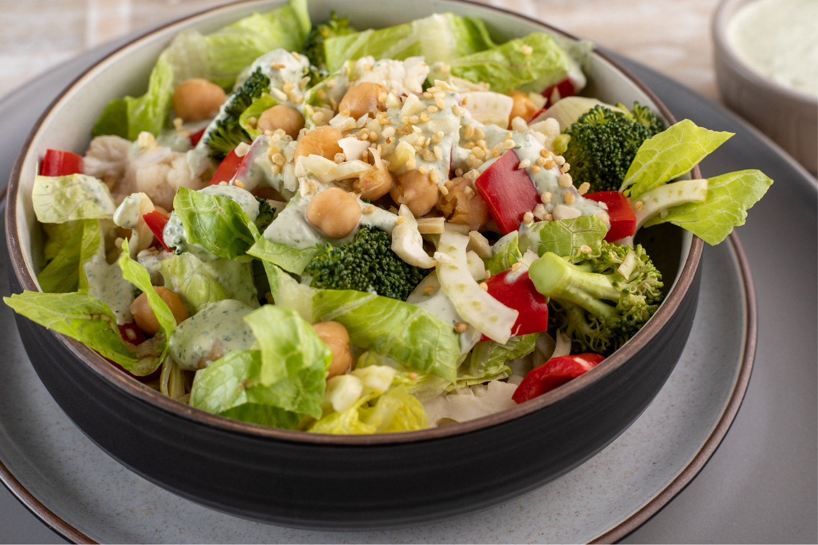Cauliflower and Broccoli Salad with Avocado Tahini Dressing